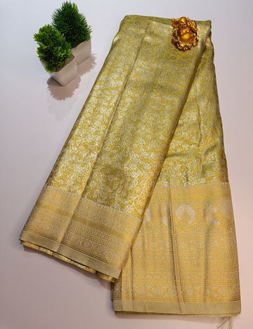 Pista Green Silk Saree with Silver Zari Border and blouse piece