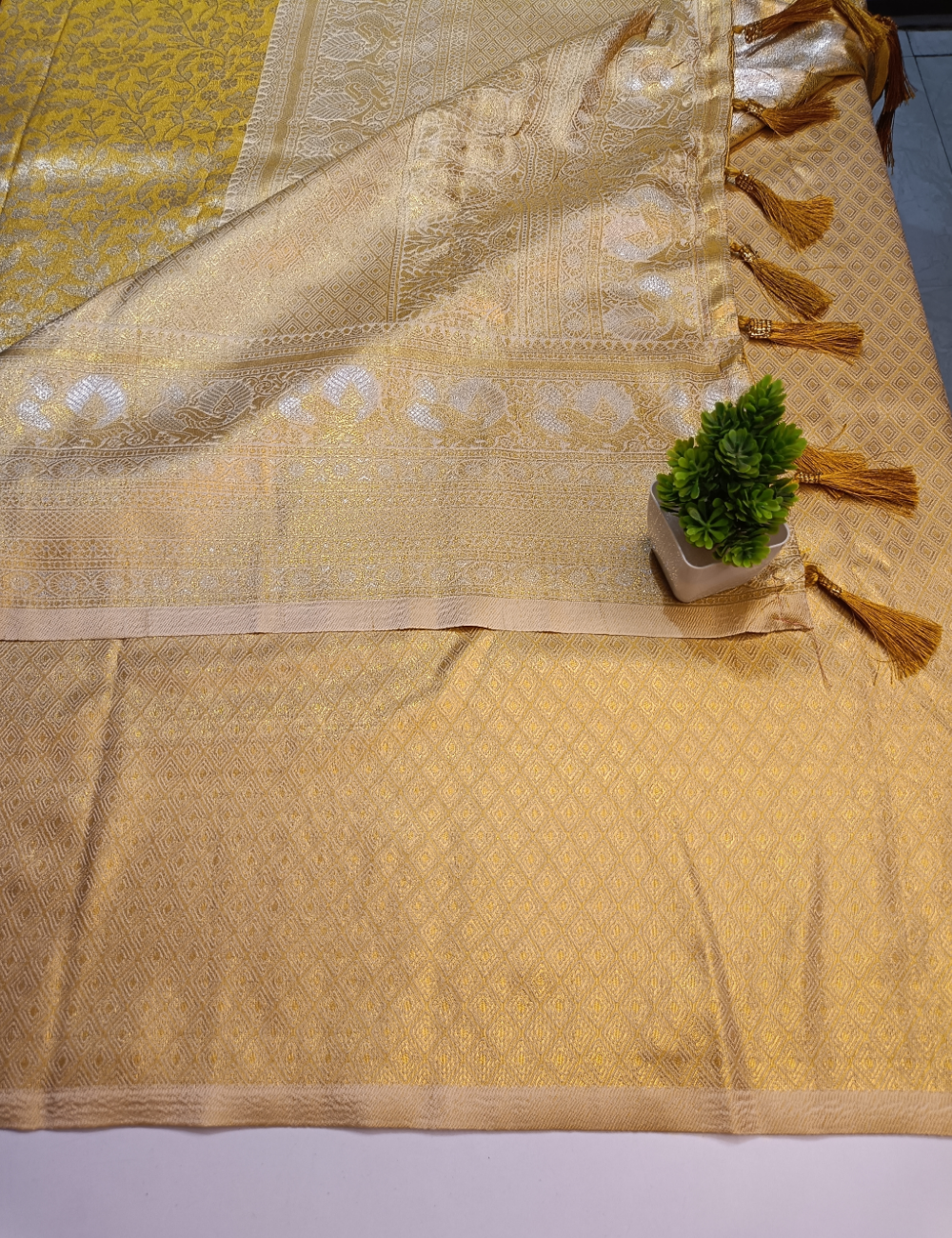 Charming Floral Silk Saree Featuring Peacock Silver Zari Border.