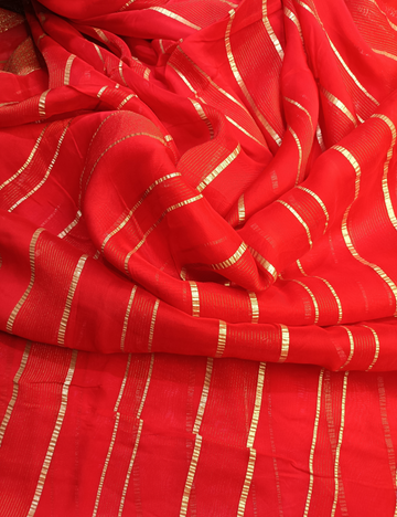 Bold Red Georgette Saree with Metallic Foil Border including worked blouse design